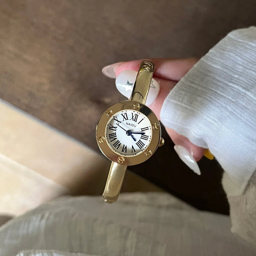 2026 new round Roman scale small dial gold bracelet watch creative design stainless steel gold quartz watch gift for women