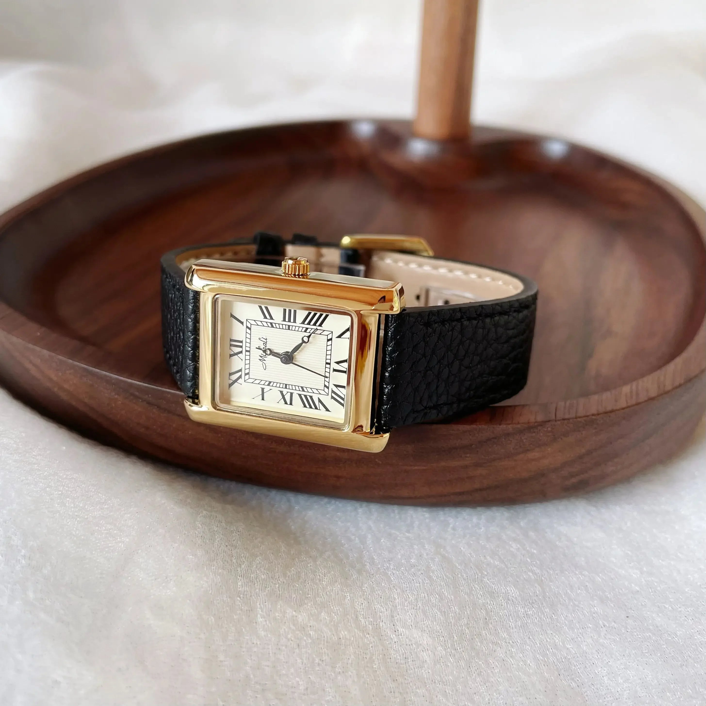 Gold Roman Watch
